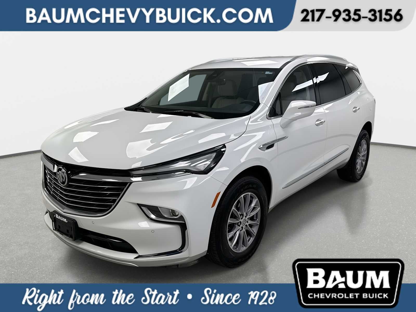 2023 Buick Enclave Essence in Summit White — front three-quarter view
